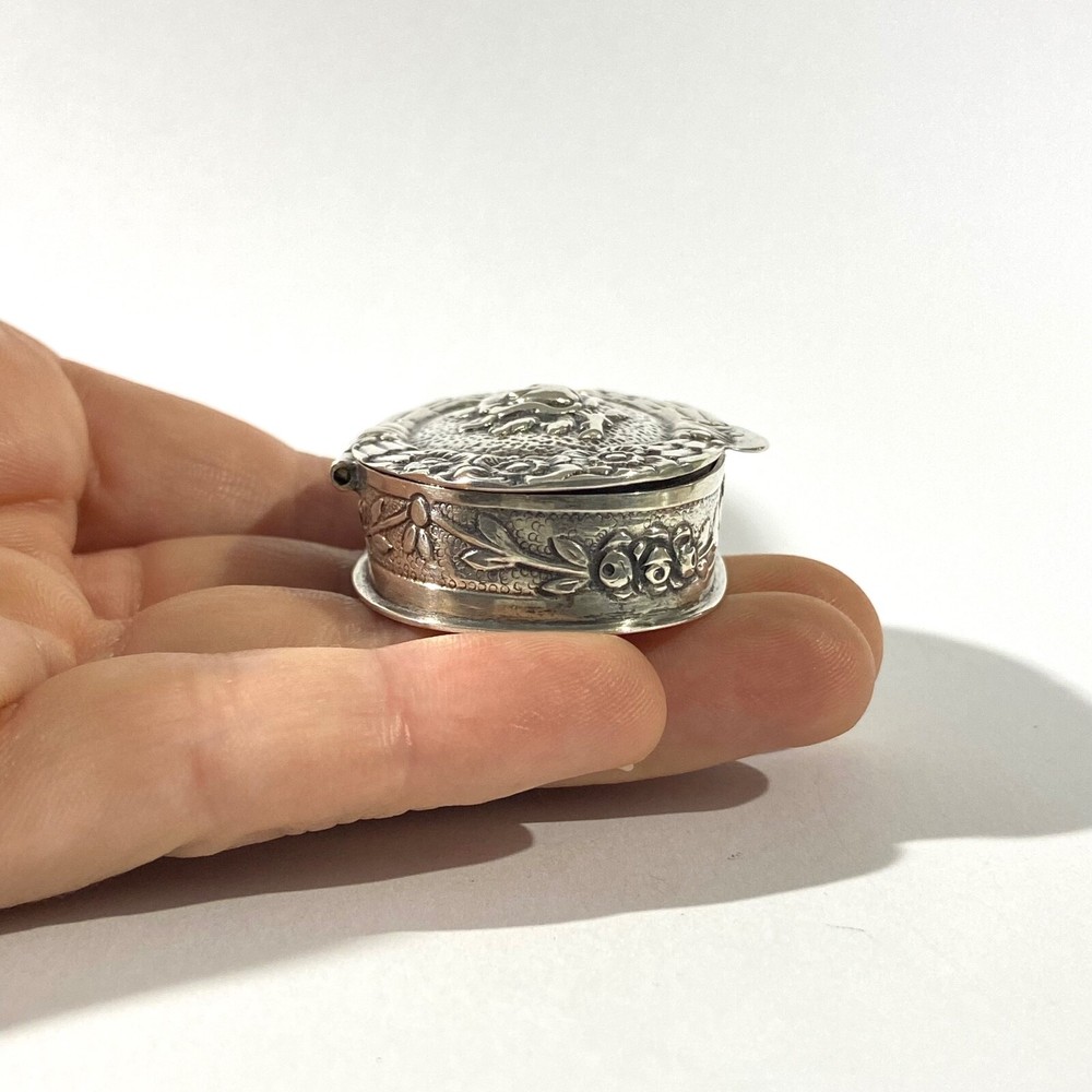 Antique Solid Silver Pillbox , Hallmarked with Floral decorations