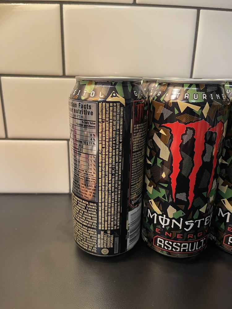 Eight (8) Monster Assault Full 16oz Cans