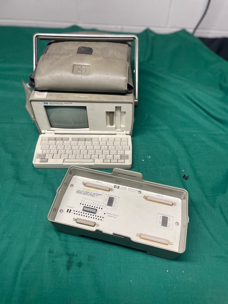 Hewlett Packard HP 4951A protocol analyzer with accessories 18180A interface