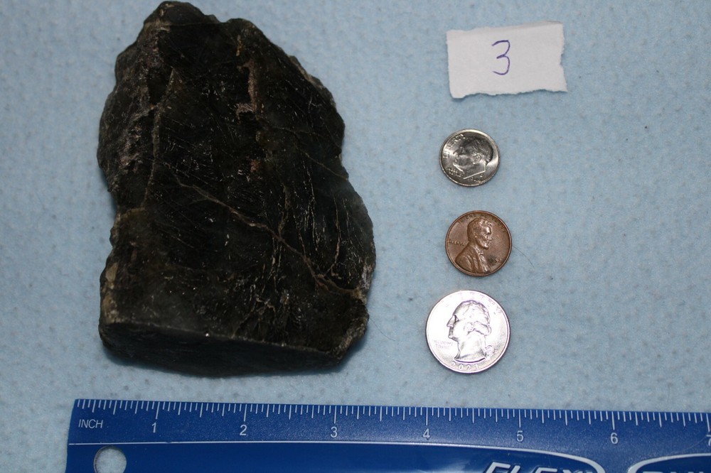 1 standing labradorite that is over 1 pound . Polished one side.