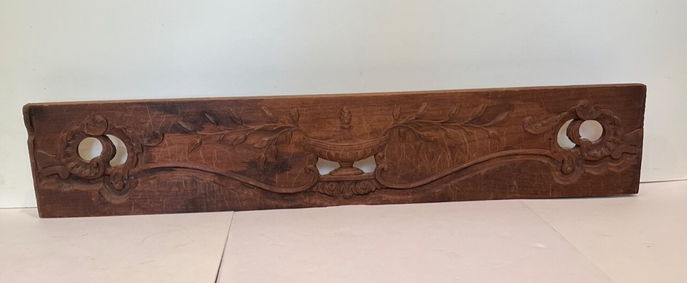 salvaged antique carved board