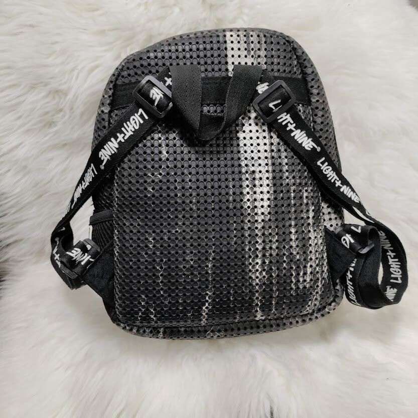Light + Nine Little Mini Perforated Black and White Kids Backpack