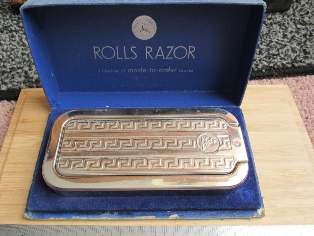 Antique Rolls Razor