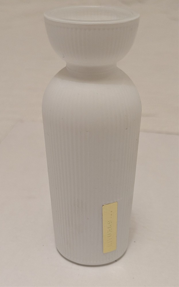 White glass bottle / jar Rituals