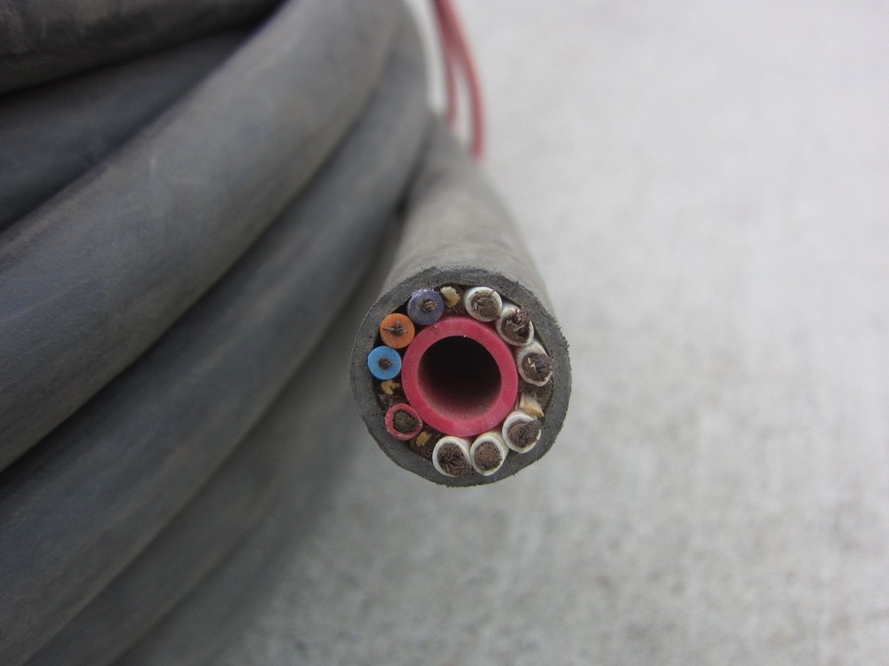 48' Plastic Hose 10C Wire plus ¼" Plastic Hose Welding Cable, Used