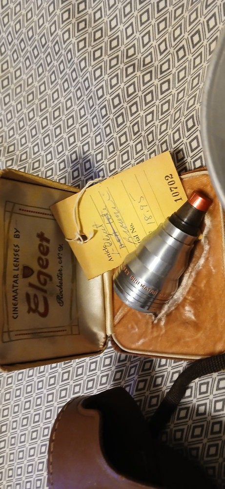 Vintage Camera,Lens, And Flash Bulb.
