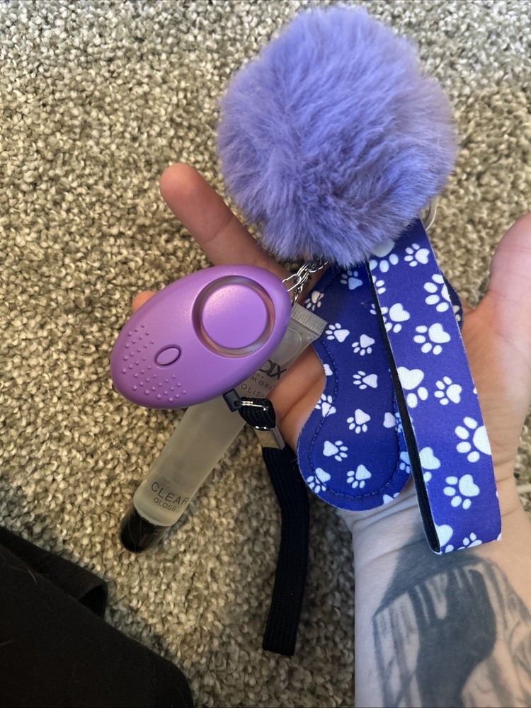 self-defense safety keychain set. The set includes various accessories