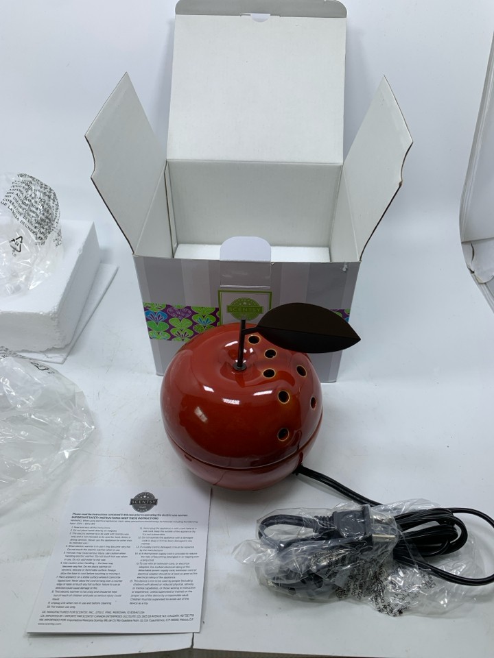 NIB CERAMIC APPLE SHAPED WAX WARMER.