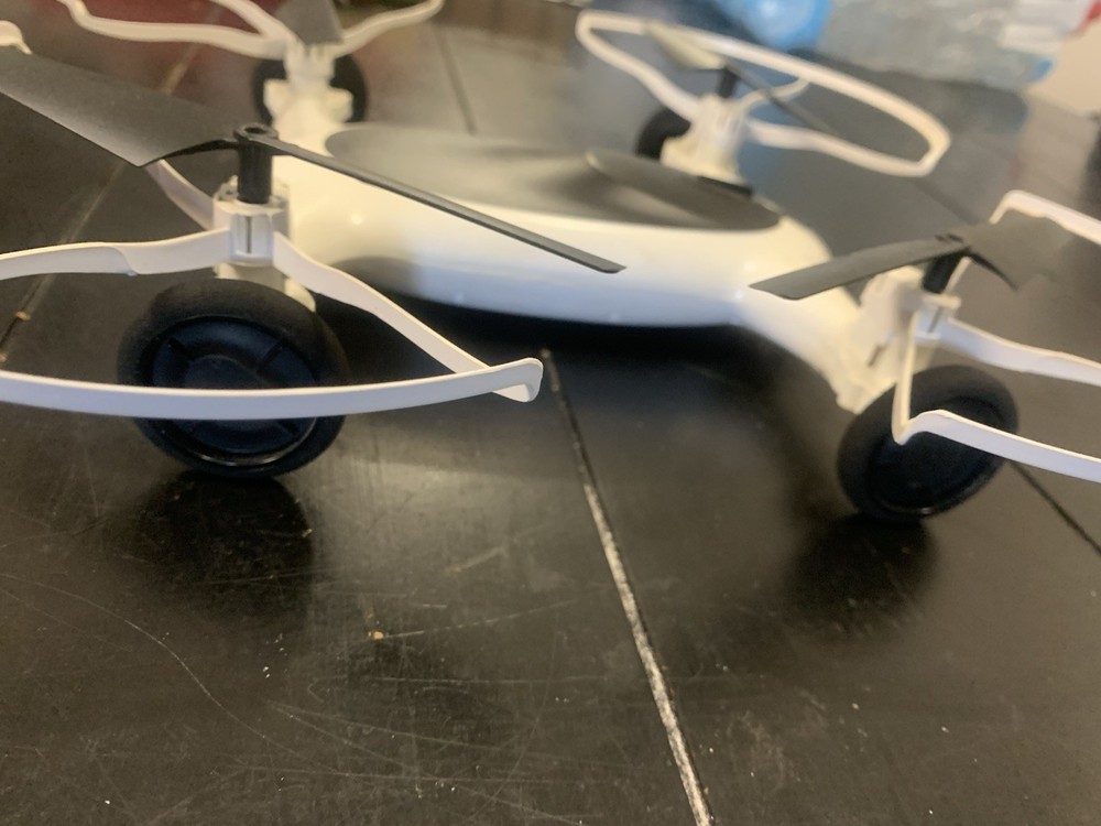 SHARPER IMAGE FLY + DRIVE 7" DRONE RECHARGEABLE DUAL FUNCTION 2.4GHZ LONG RANGE