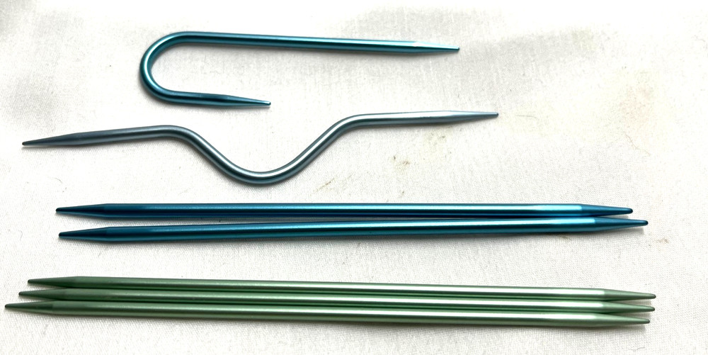 Seven Knitting Needles