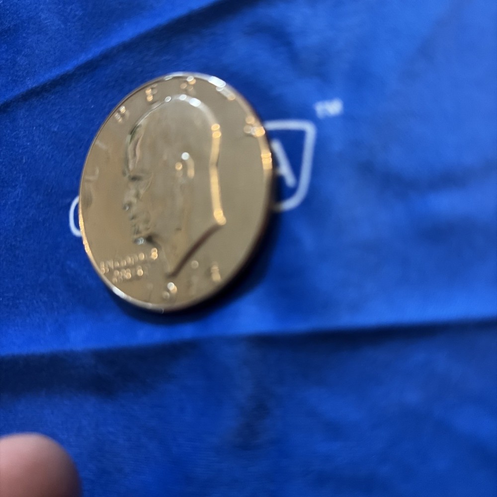 1977 Dollar Coin “Rare” D Minted filled d immaculate!