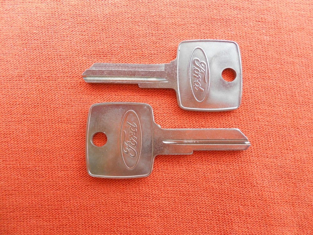 2 FORD LOGO FUEL TOOL BOX COMPARTMENT KEY BLANKS