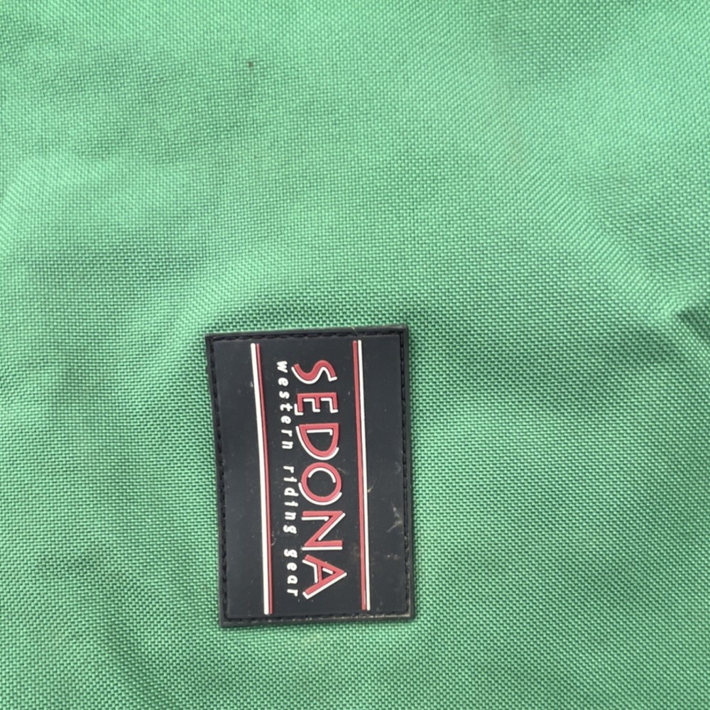 3 saddle covers. One new 2 used