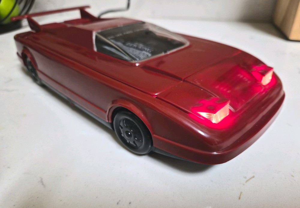 Vintage Red Car Cassette Rewinder. Electronics with Working Lights