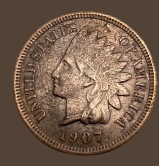 1907 AU indian head penny Has diamonds Still