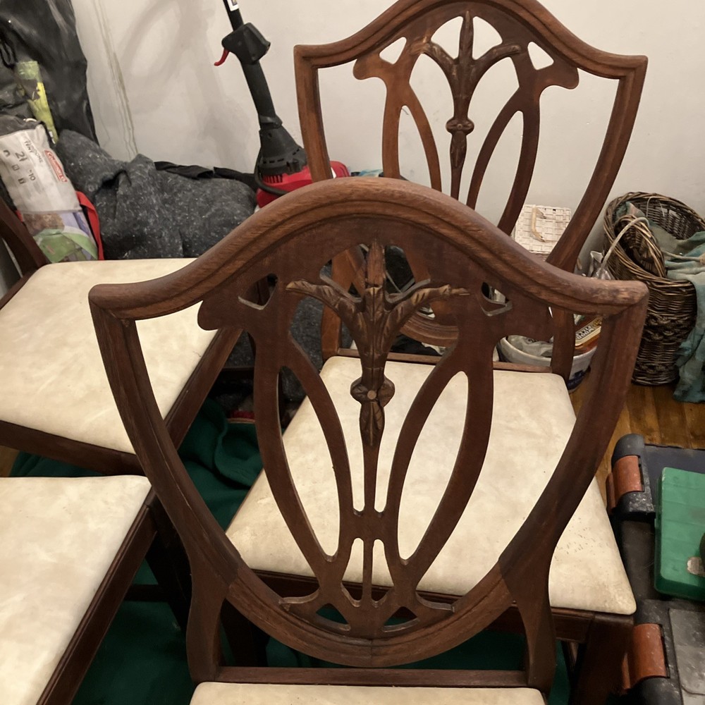 Four matching shield back mahogany dining room chairs