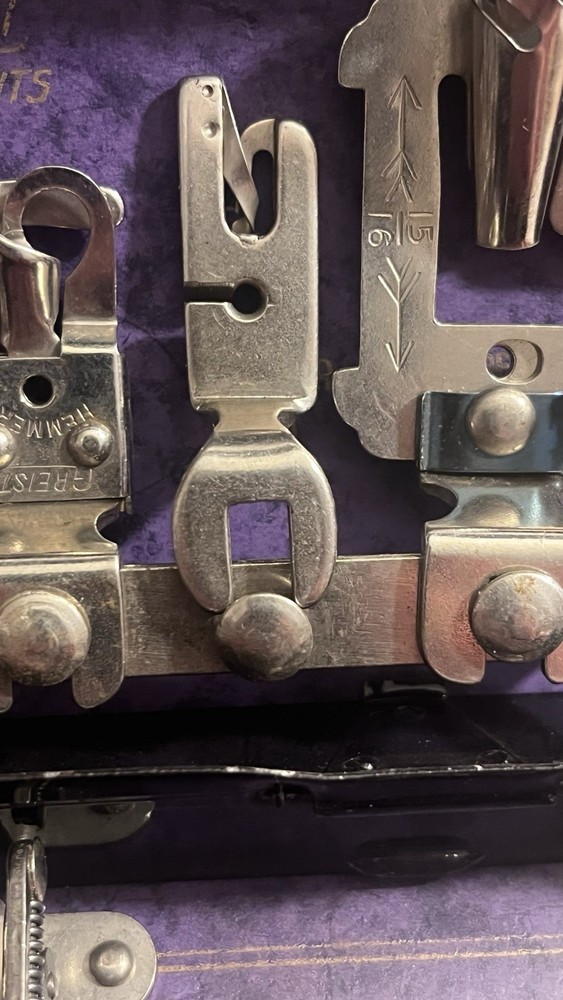Vintage Greist Sewing Machine Attachments in “Rotary” Tin.