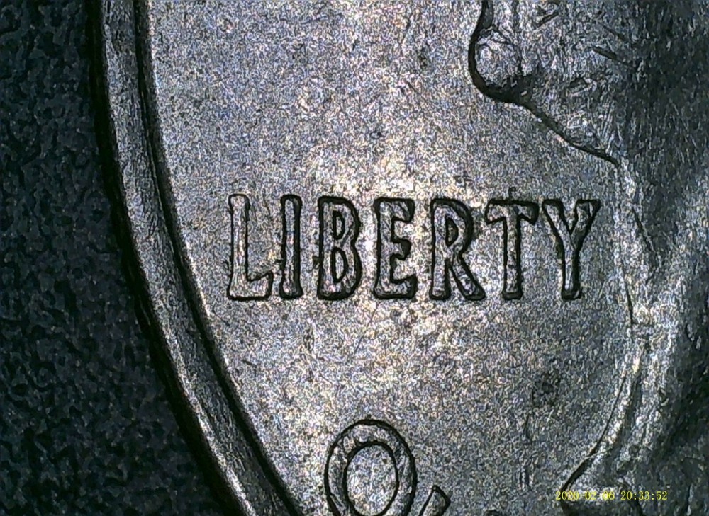 2008-D Alaska quarter Grease strike error
