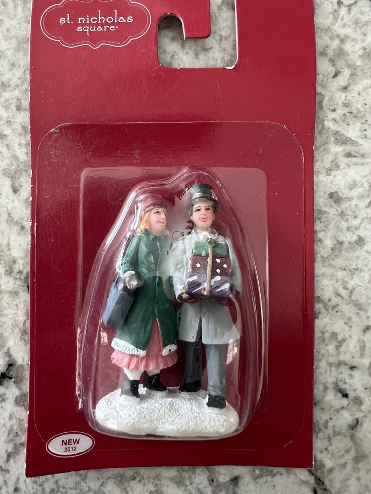 Couple w/presents walking St Nicholas square accessory.