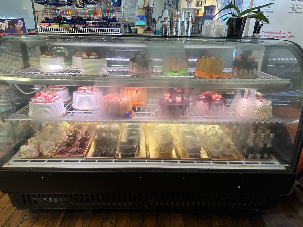 true curved glass display merchandiser