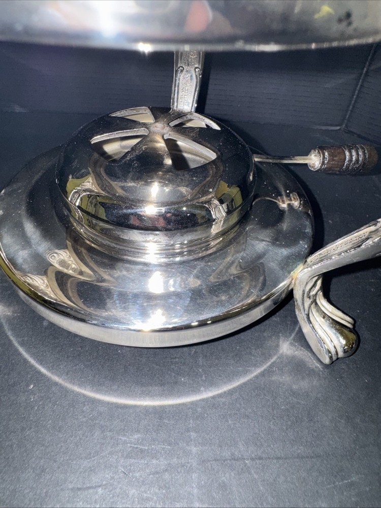 Ornate silver-plated chafing dish with lidded server and stand