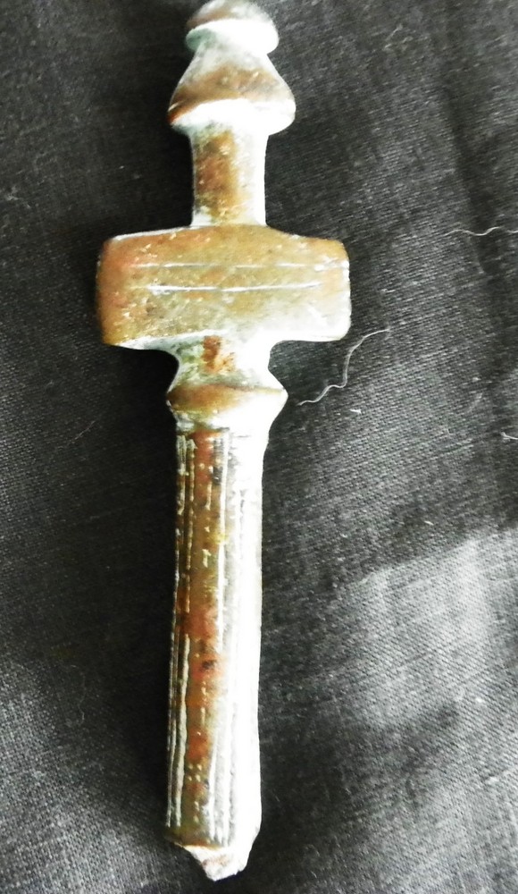 Ancient bronze knife handle