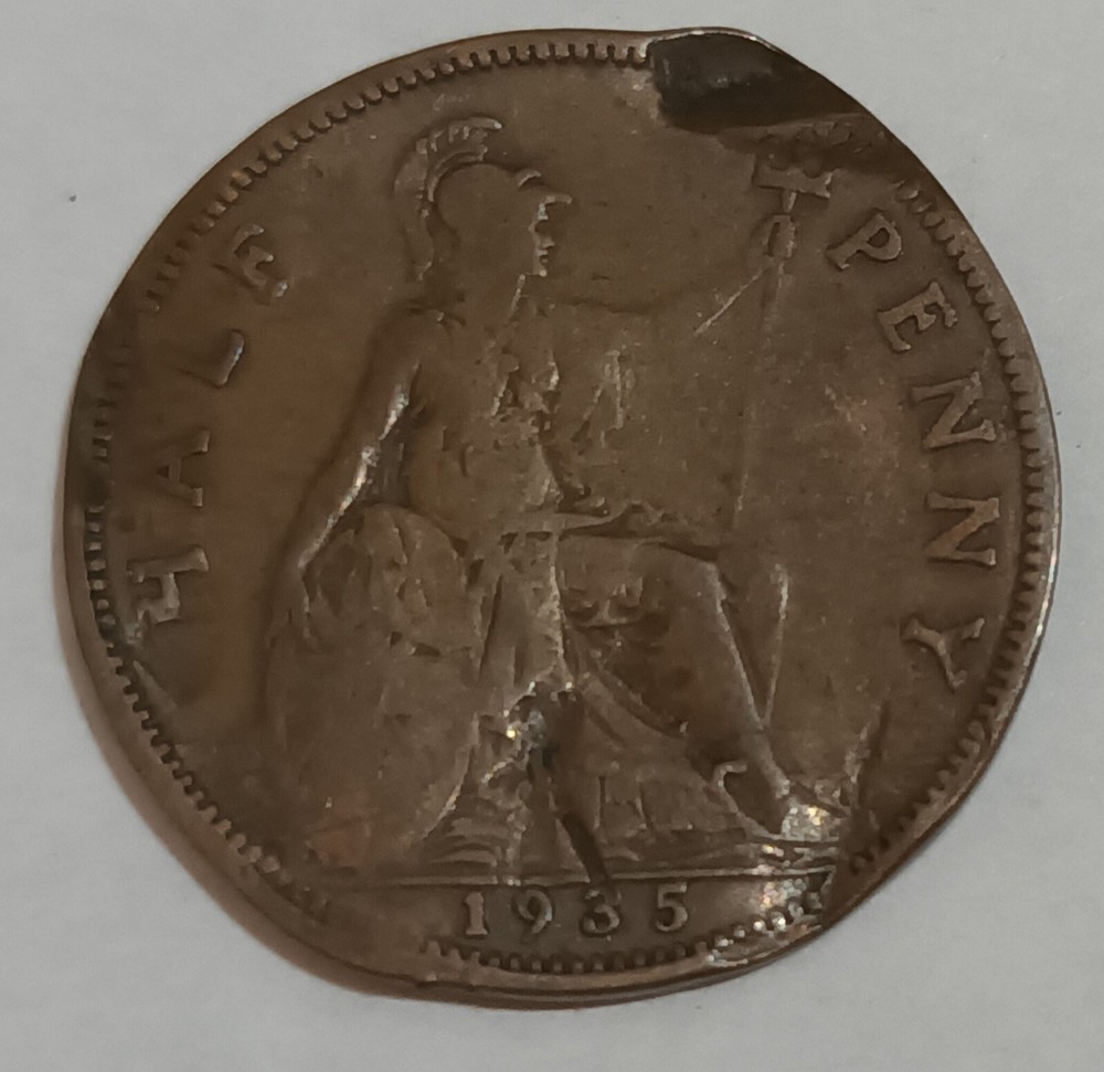 George V and George VI coins with error