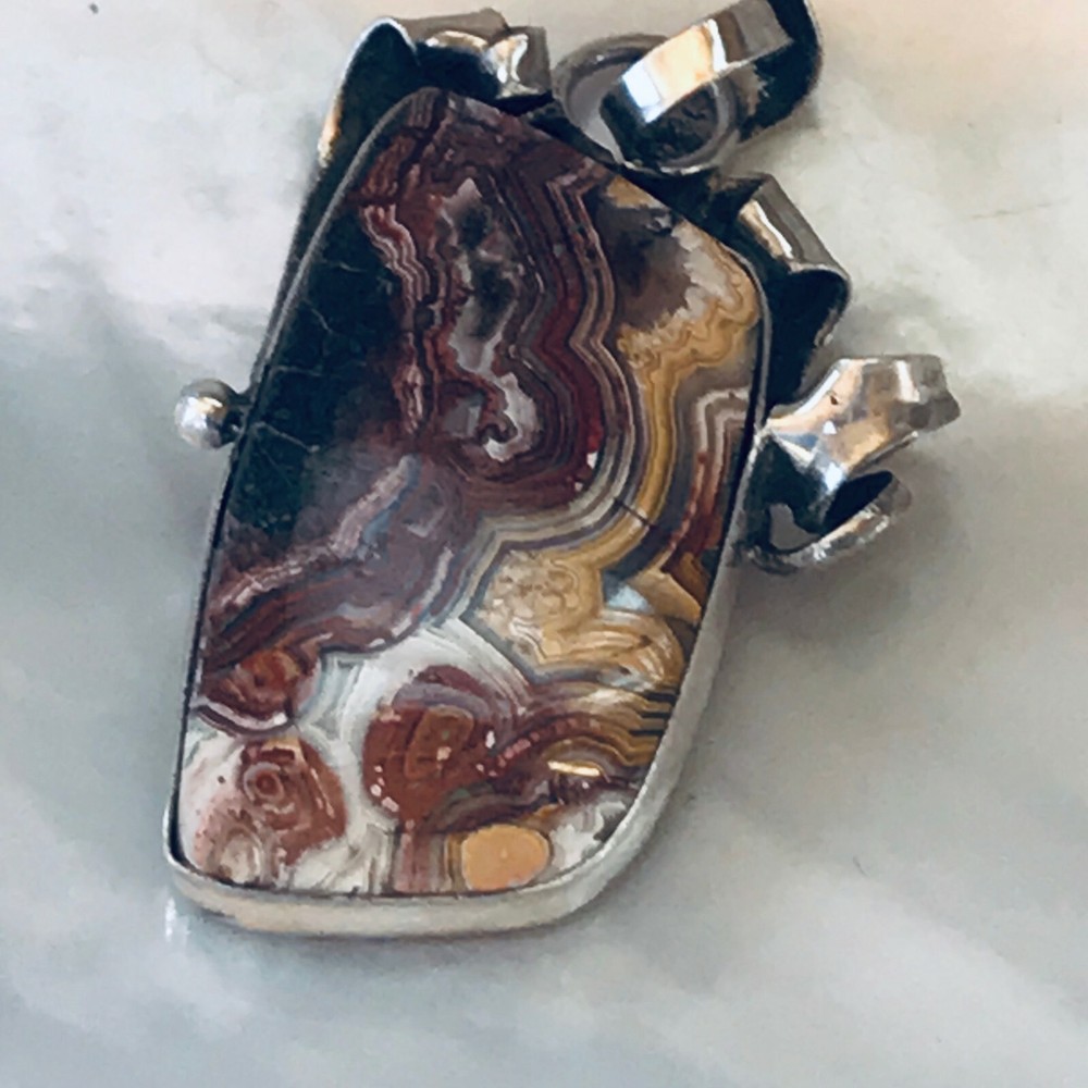 Estate E. Herrara Signed Reddish Brown Black & White Agate Stone in Curled Silve