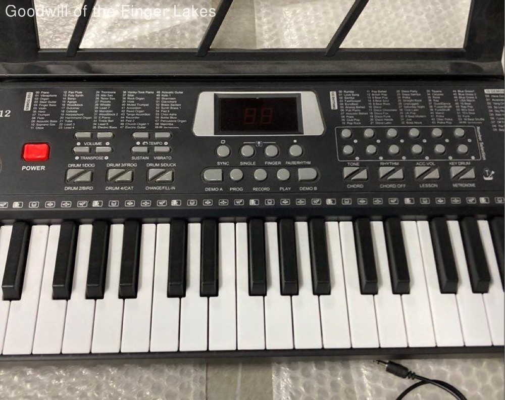 Unbranded 61Keys Electronic Keyboard Powers ON