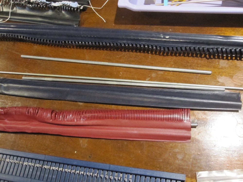 Bond Knitting Machine Two Beds Plus Extensions, Cast on Combs, some Accessories.