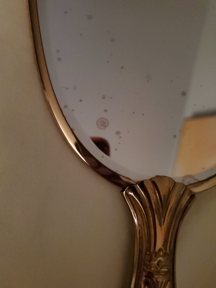 Vintage art deco brass handheld vanity mirror