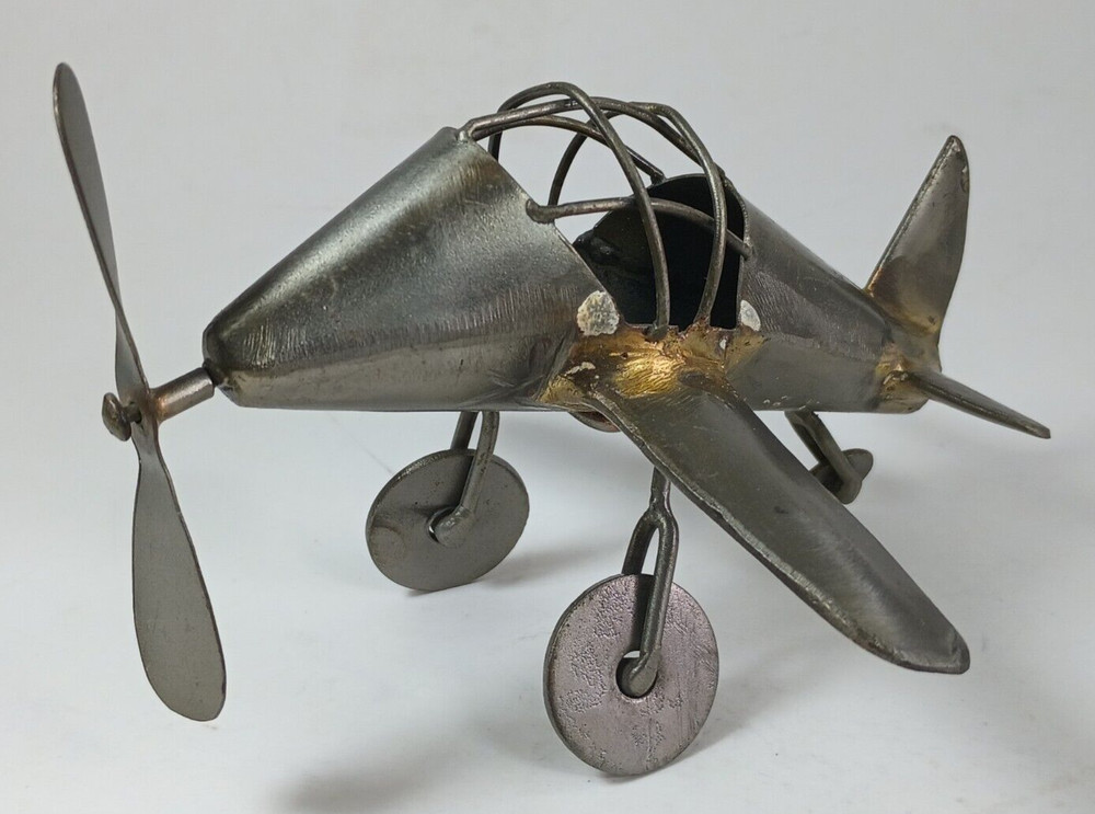 Whimsicle Metal Art Airplane.