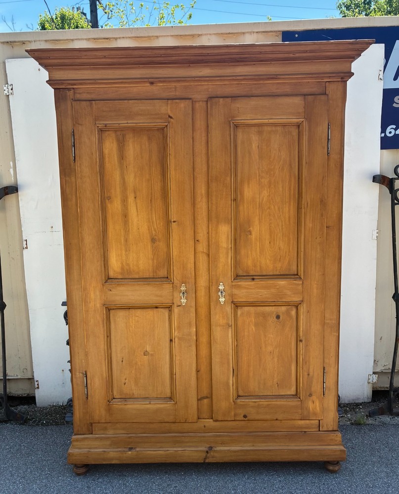 Antique Two Door Eight Panel Knock-Down Armoire