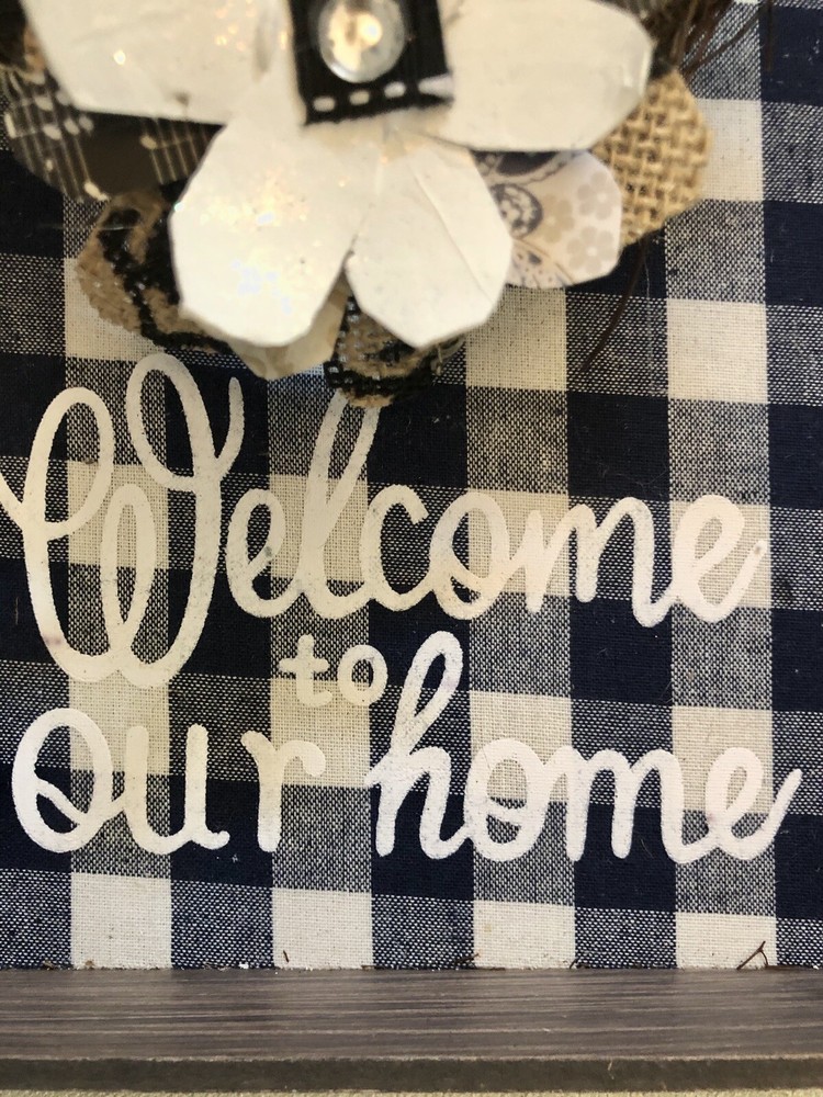 wooden welcome sign