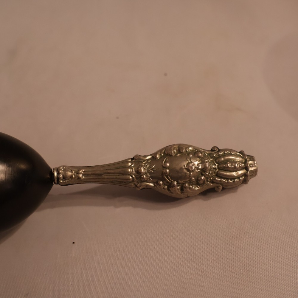 Darner with silver handle