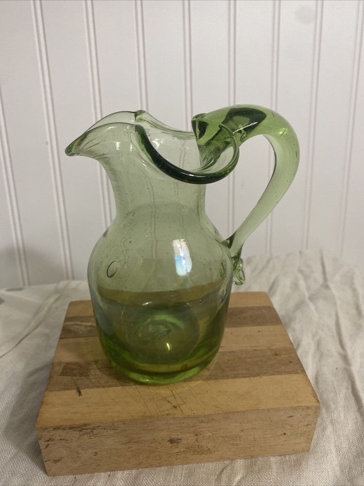 green glass pitcher vintage