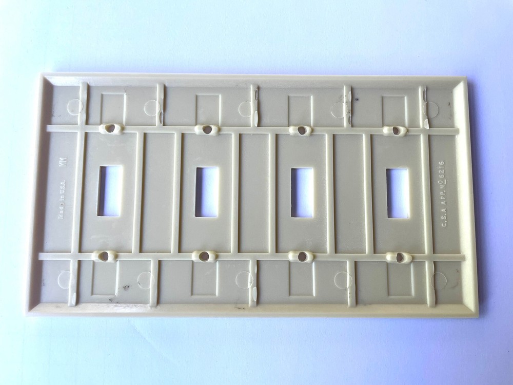 Vintage bakelite 4 Gang switch wall plate ivory