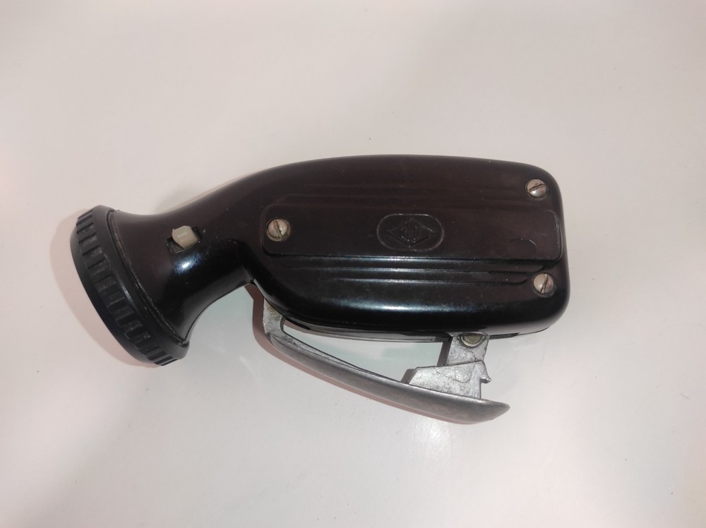 Soviet electrodynamic flashlight called "Zhuchok." "B-44."