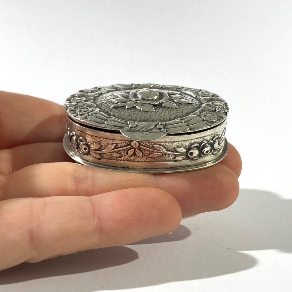 Antique Solid Silver Pillbox , Hallmarked with Floral decorations