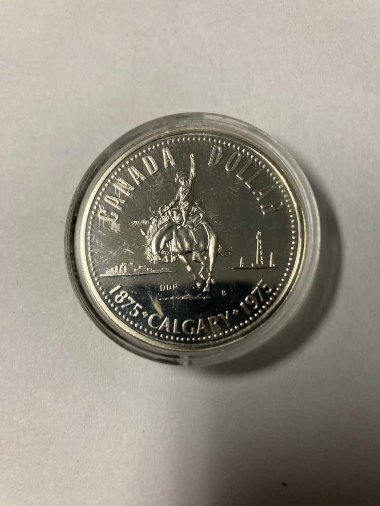 1975 CANADIAN CALGARY SILVER DOLLAR .500