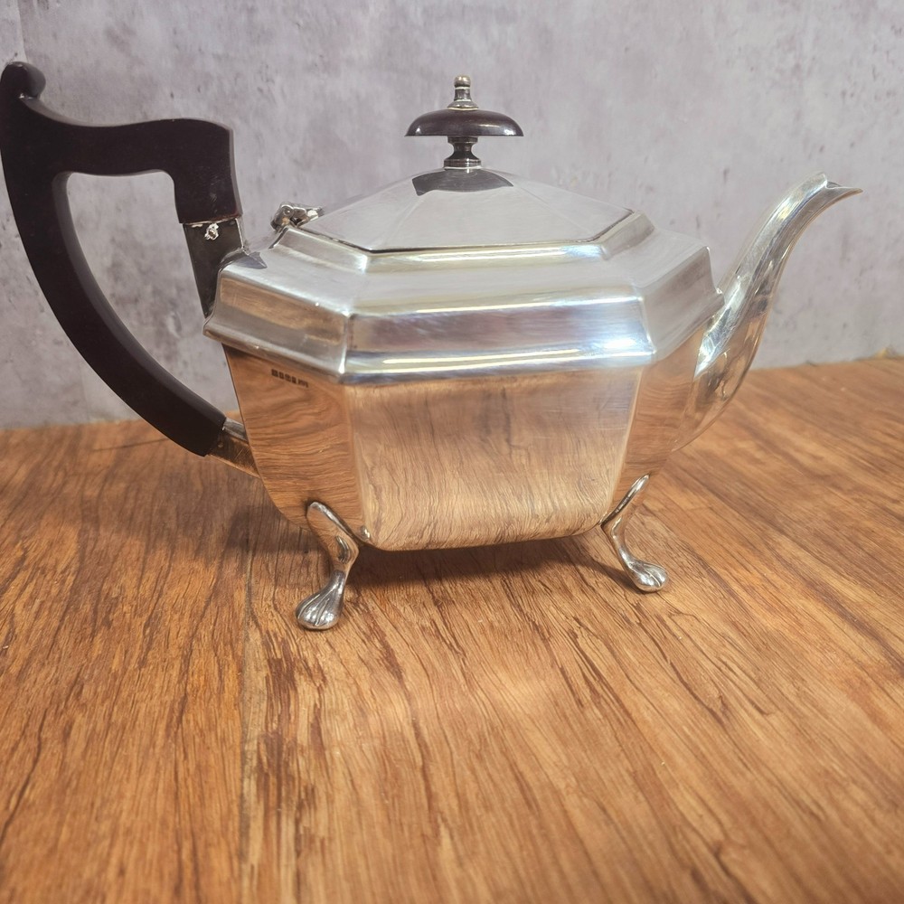 Early Art Deco Three Piece Sheffield Silver Plate Tea Set, Ebonised Handle. Prop