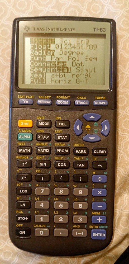 Texas Instruments TI-83 Graphing Calculator Programmable LCD Display