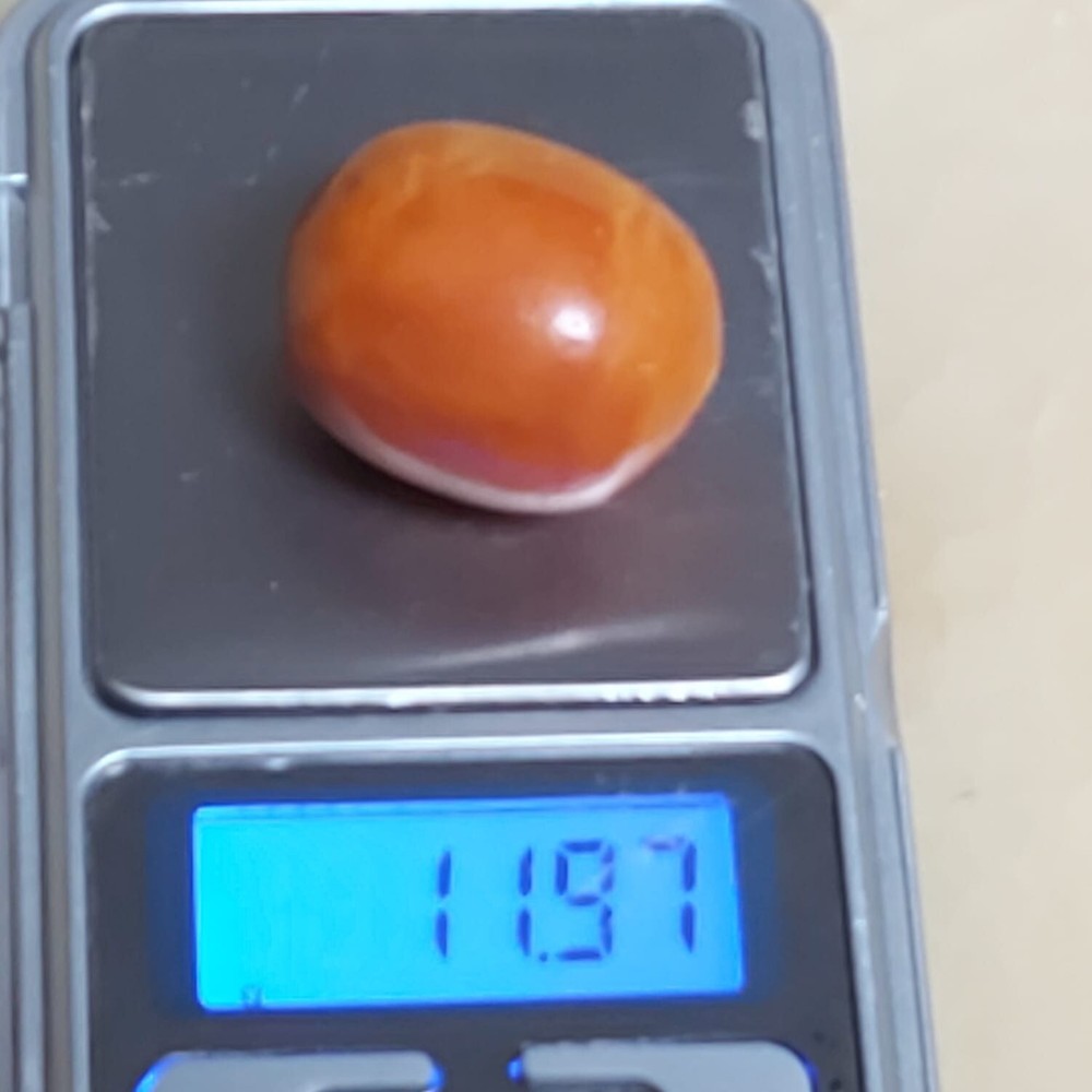Ancient large amber cabochon bead