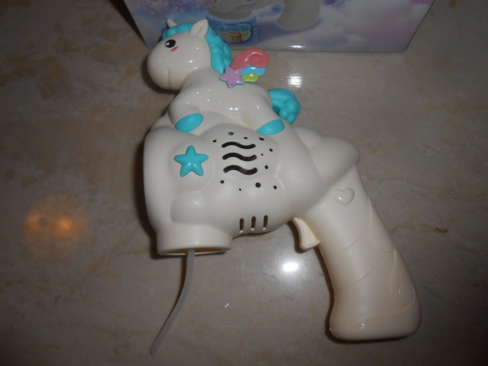 Blue Unicorn Bubble Gun Blower in box.