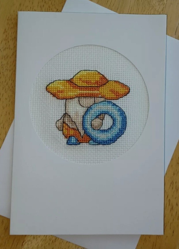 Summer gnome: Swim ring Finished X-stitch. White card, blank insert & envelope