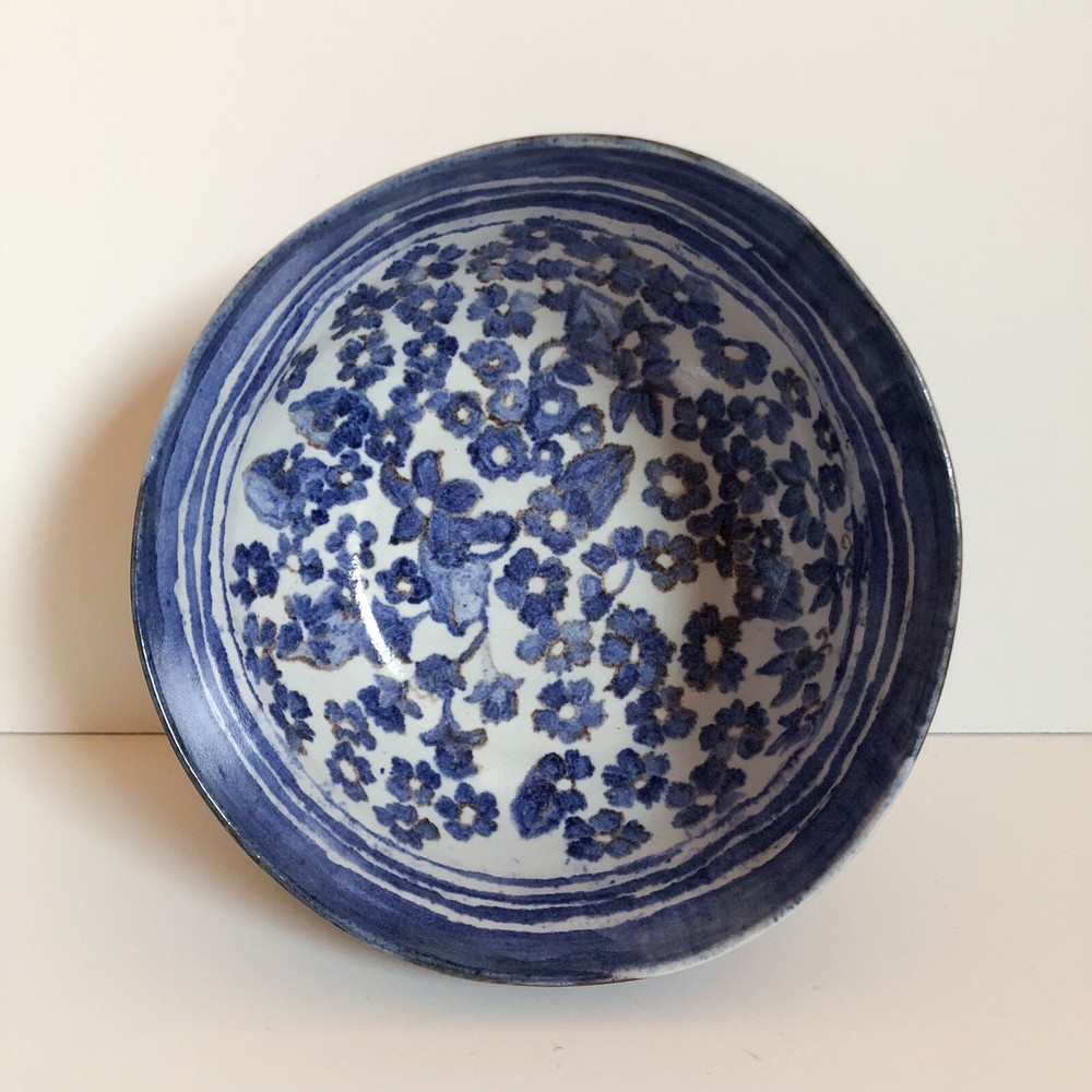 Signed Capuchin style bowl w/ glossy floral interior