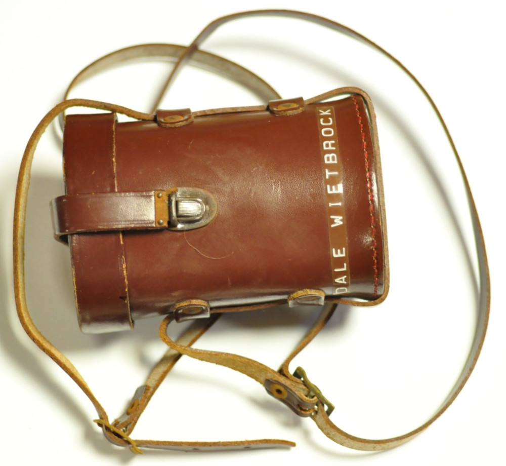 Brown leather oval lens case as shown. READ.