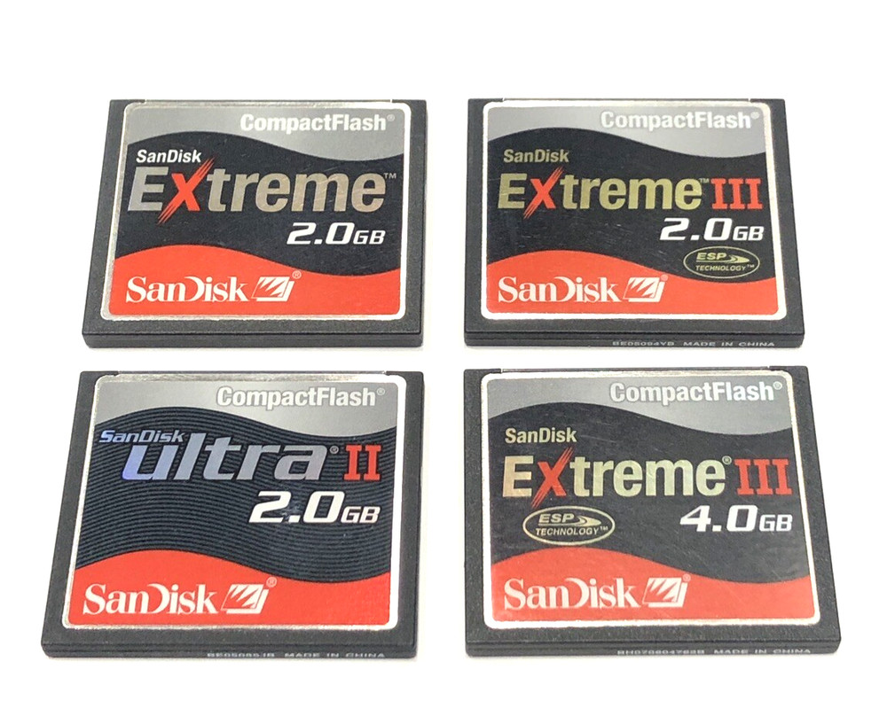 FOUR ASSORTED SANDISK COMPACT FLASH MEMORY CARDS - THREE 3GB AND ONE 4GB