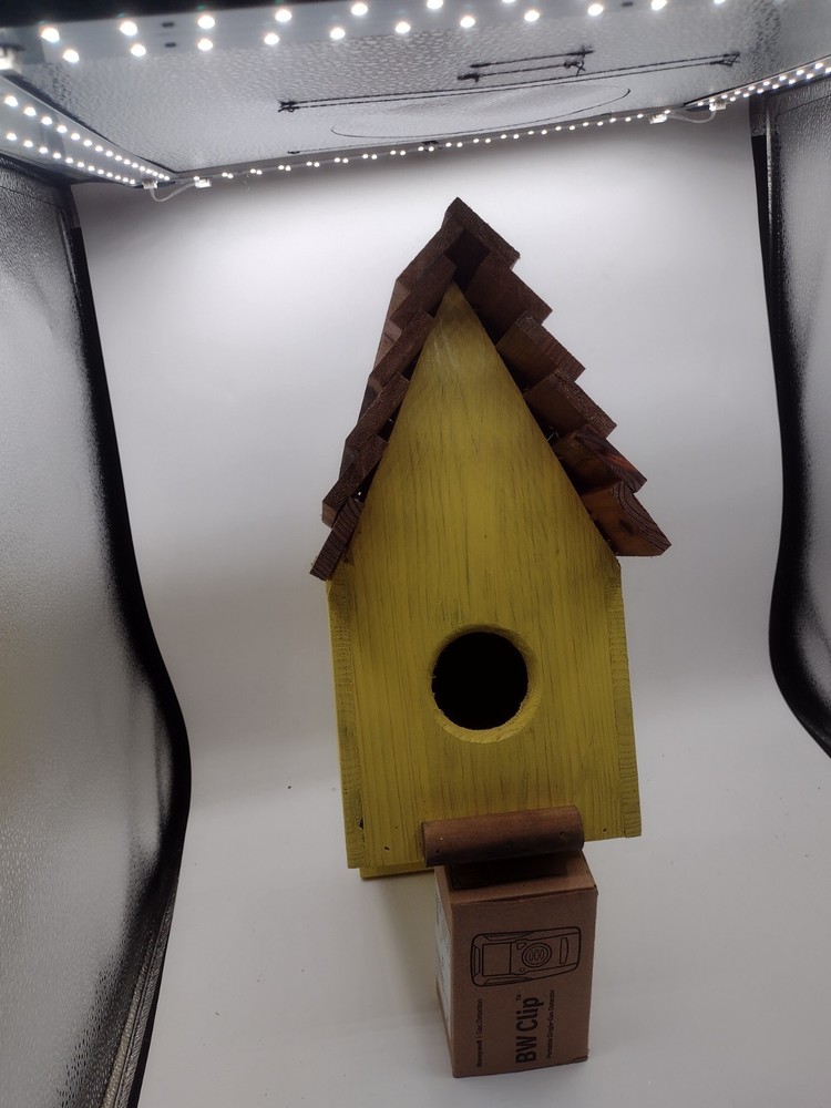 Pretty Birdhouse made of cedar with yellow stain