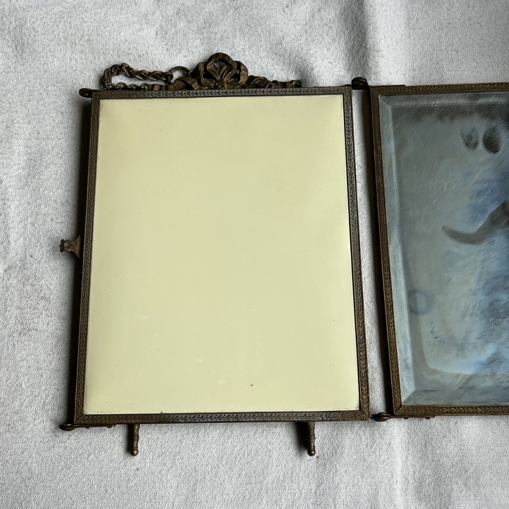 Antique Brass Tri-Fold Celluloid Cherub Hanging Vanity Mirror